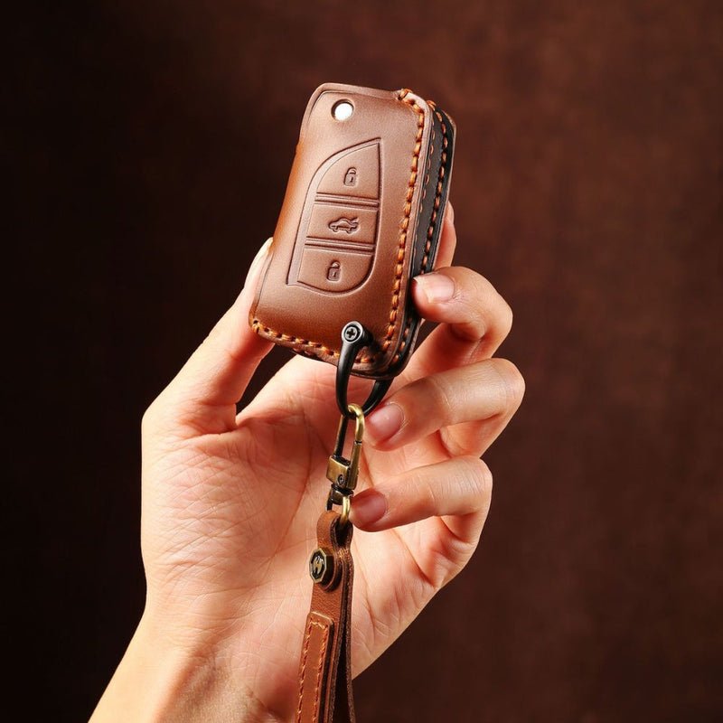 Load image into Gallery viewer, Toyota Handcrafted Genuine Leather Folding Car Key Fob Protective Case Cover For RAV4, Avalon, Avensis, Aygo, Camry, Corolla - Polar Tech Australia
