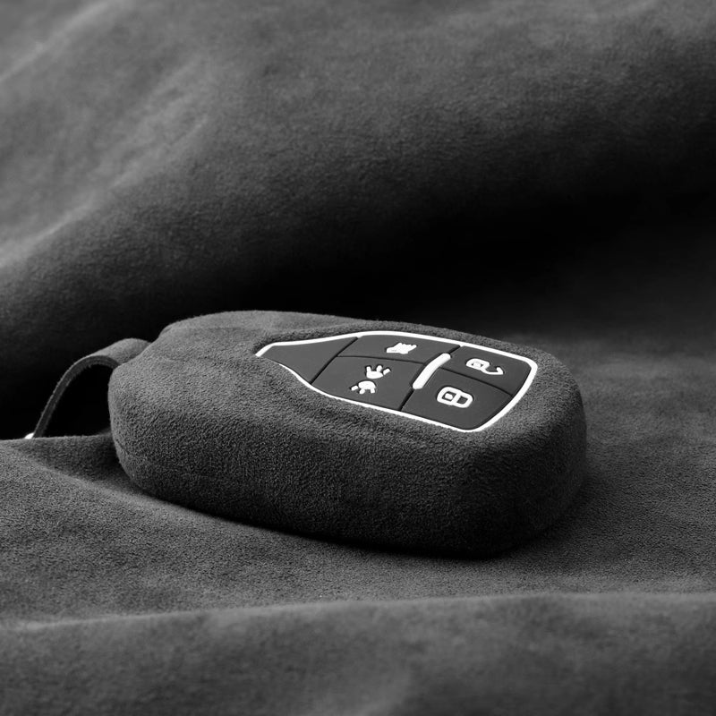Load image into Gallery viewer, Luxury Suede Car Key Fob Case Cover for Maserati Levante, MC20, Ghibli, Quattroporte 2014-2022 – Skin-Friendly, Durable &amp; Stain-Resistant
