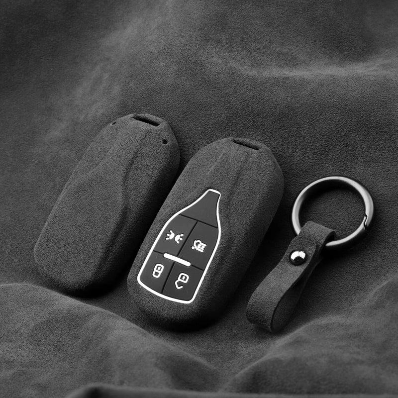 Load image into Gallery viewer, Luxury Suede Car Key Fob Case Cover for Maserati Levante, MC20, Ghibli, Quattroporte 2014-2022 – Skin-Friendly, Durable &amp; Stain-Resistant
