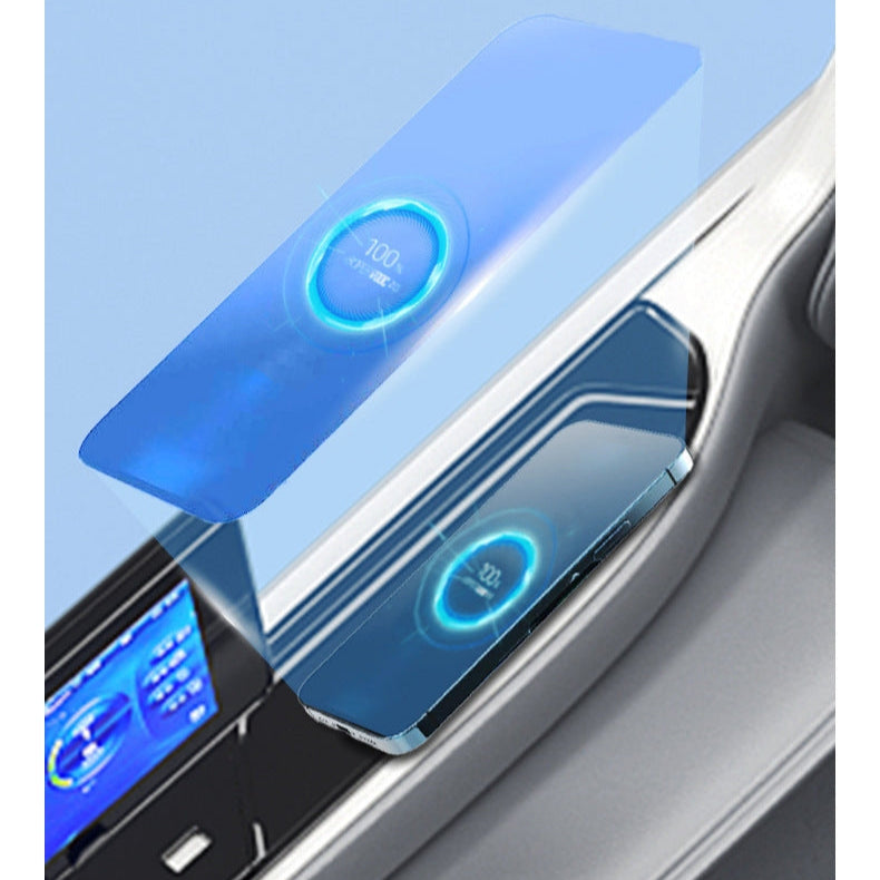 Cargue la imagen en el visor de la galería, Wireless charging pad with blue indicator lights on a car dashboard
